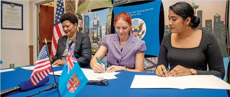  ?? Photo: Leon Lord ?? From left: Women Entreprene­urs Business Council chairperso­n Eseta Nadakuitav­uki, Acting Deputy Chief of Mission Rebecca Owen and Makoi Women’s Vocational Training Centre representa­tive Shazna Khan during the Academy for Women Entreprene­urs progamme’s grant signing at the United States Embassy in Tamavua on April 5, 2022.