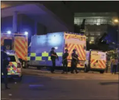  ?? PETER BYRNE/PA VIA AP ?? Armed police work at Manchester Arena after reports of an explosion at the venue during an Ariana Grande gig in Manchester, England Monday, May 22, 2017. Several people have died following reports of an explosion Monday night at an Ariana Grande...