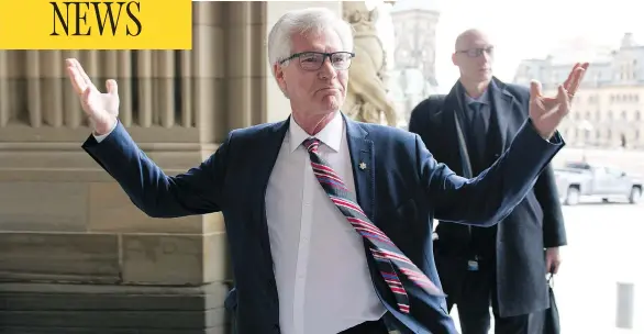  ?? JUSTIN TANG / THE CANADIAN PRESS FILES ?? Minister of Natural Resources Jim Carr gestures in response to a question as he arrives on Parliament Hill ahead of an April meeting on the deadlock over Kinder Morgan.