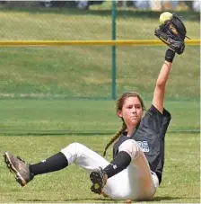  ?? STAFF PHOTO BY ROBIN RUDD ?? Sale Creek center fielder Hannah Hall shows the ball after making a diving catch. Sale Creek fell to Summertown, 7-5, in the final of the TSSAA Class A softball tournament at the Starplex in Murfreesbo­ro.