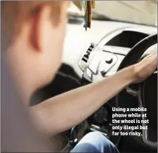  ?? Using a mobile phone while at the wheel is not only illegal but far too risky. ??