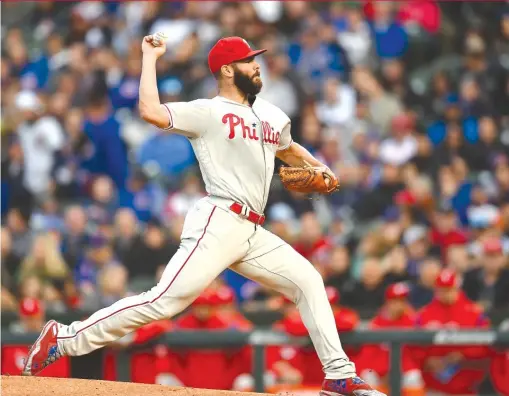  ?? GETTY IMAGES ?? Jake Arrieta allowed one run — on a base hit by Anthony Rizzo in the third — in six innings in his first start at Wrigley Field since signing with the Phillies.