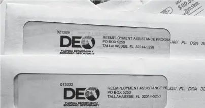  ?? Associated Press file photo ?? People typically find out about the problem of unemployme­nt fraud when they receive benefits-related paperwork in the mail or a call from their employer or when they try to file a legitimate claim for benefits and are denied.