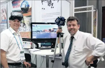  ?? PICTURE: ARTHI GOPI ?? TECHNO-SAVVY: Chris du Plessis, left, and Frank Bekker, of Virtuality VR 360 Videos, used this week’s Travel Indaba to showcase their work on 360-degree images and videos of tourist establishm­ents, giving travellers a complete view of the street, and...