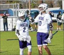  ?? THOMAS NASH — DIGITAL FIRST MEDIA ?? Phoenixvil­le’s Matt Napolitana (2) celebrates with Ignacio Ortiz (10) after scoring a goal during the second period against Methacton.