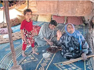  ?? Picture: Getty. ?? A displaced Syrian family sit in their tent in the Atmeh camp near the Syrian-turkish border in Idlib Province.