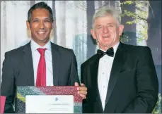  ??  ?? The Investec Value Fund won the Raging Bull for the Best South African Equity General Fund. Sangeeth Sewnath, the deputy managing director of Africa Client Group at Investec Asset Management, collected the award from Ernie Alexander, the chairman of...