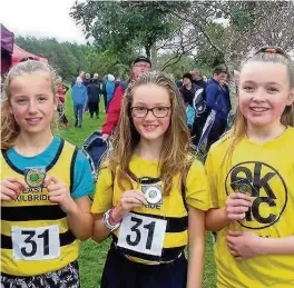  ??  ?? U13 champs from left: Ella Comiskey, Leah Muirhead and Abbie Kirwan