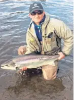  ??  ?? Davie Stewart with a 20lb fish at Pitlochry.