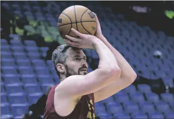  ?? AP PHOTO/MATTHEW HINTON ?? Cleveland Cavaliers forward Kevin Love warms up before an NBA basketball game against the New Orleans Pelicans in New Orleans, on Feb. 10.