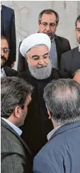  ?? Foto: Iranian Presidency, afp ?? Präsident Ruhani im Kreis von Parla  mentariern.