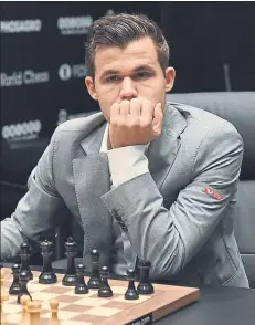  ?? FOTO: EFE ?? El noruego Magnus Carlsen defiende en Londres su título mundial