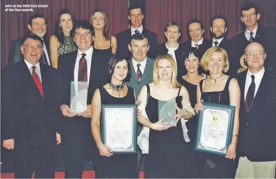  ??  ?? John at the 2002 GAA School of the Year awards.