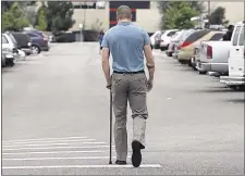  ?? BRENNAN LINSLEY/ASSOCIATED PRESS ?? Josh Nowlan, who was wounded by multiple gunshots in the 2012 Aurora movie theater attack, walks away after the reading of the verdict in penalty phase 2 of the James Holmes trial in Centennial, Colorado, on Monday.