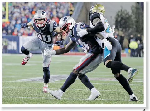  ?? AP ?? Danny Amendola (80), making this secondhalf catch on Sunday, produced the key play that kick-started the Patriots comeback.