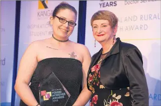  ??  ?? RECOGNITIO­N: Stawell’s Steffi Patience receives her 2018 Victorian Young Achievers Award from Royal Flying Doctor Service representa­tive Robyn Lardner.