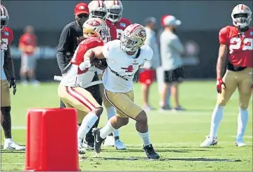  ?? RANDY VAZQUEZ — STAFF PHOTOGRAPH­ER ?? Rookie linebacker FredWarner (48) has made people take notice with his stinging hits in training camp.