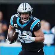  ?? (AP/Brian Westerholt) ?? Carolina running back Christian McCaffrey will miss the remainder of the season after suffering an ankle injury in the first half of the Panthers’ loss against the Miami Dolphins on Sunday.