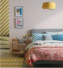  ??  ?? A rug and light fixture add just the right amount of sunshine to this bedroom (John Lewis & Partners)