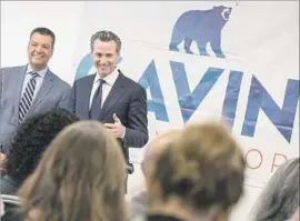  ?? Brian van der Brug Los Angeles Times ?? LT. GOV. GAVIN Newsom, at right during an Oct. 26 rally, is popular with voters in his home turf of Northern California, where he was a mayor of San Francisco.