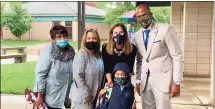  ??  ?? Lt. Gov. Susan Bysiewicz, second from right, poses for a photograph with the family of Middletown Schools Superinten­dent Michael Conner, right, at Lawrence Elementary School on Thursday morning.