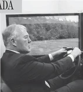  ?? CHRIS YOUNG / THE CANADIAN PRESS FILES ?? Bill Blair, the Liberals’ point man on legalizing marijuana, sits in a simulator that mimics the effects of driving under the influence of pot, earlier this year in Toronto.