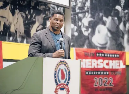  ?? NICOLE CRAINE/THE NEW YORK TIMES ?? Republican U.S. Senate candidate Herschel Walker campaigns last week at the Georgia Sports Hall of Fame in Macon.