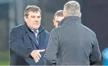  ??  ?? Tommy Wright goes to shake the hand of Craig Levein at the end of last month’s Perth meeting.