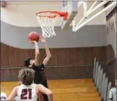  ?? Appeal-democrat ?? Marysville High’s Anthony Gonzales goes up for a basket during Wednesday’s game in Bear River. Gonzales finished the night with 21 points.