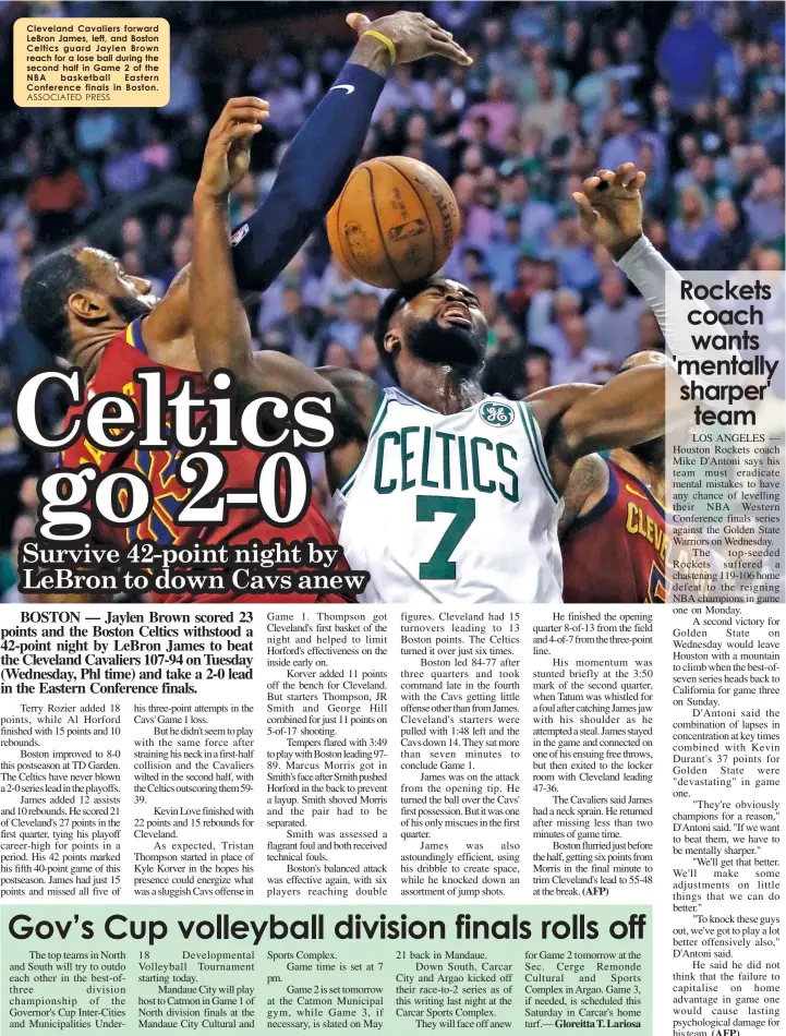  ??  ?? Cleveland Cavaliers forward LeBron James, left, and Boston Celtics guard Jaylen Brown reach for a lose ball during the second half in Game 2 of the NBA basketball Eastern Conference finals in Boston.