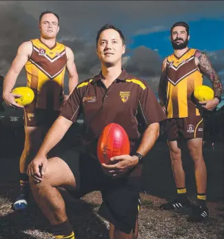  ?? READY: University coach Zammi Rohan ( front) with co- captains Jarryd Graham and Ben Deguara in the club’s new guernseys for the 2017 TAFL season. Picture: SCOTT RADFORD- CHISHOLOM ??