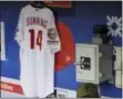  ?? MICHAEL PEREZ — THE ASSOCIATED PRESS ?? Larry Bowa sits next to former pitcher Jim Bunning’s jersey before the start of Saturday’s game against the Cincinnati Reds.