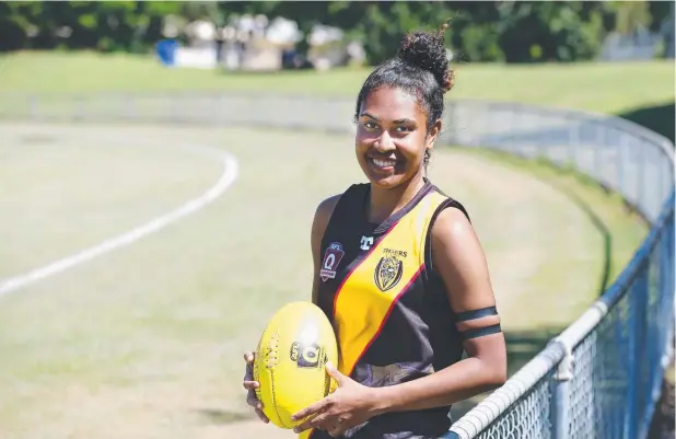  ?? Picture: BRENDAN RADKE ?? SUNS CALL-UP: Sodyla Kris, who has been selected to play for the Gold Coast Suns in the AFL Winter Series, played her 100th AFL game in the AFL Women's match between Cairns Saints and her Norths Tigers recently.