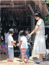  ??  ?? PLAY TIME: At Panyotai, children are allowed to run free and experiment with outdoor activities and manual labour, such as making fertilizer.