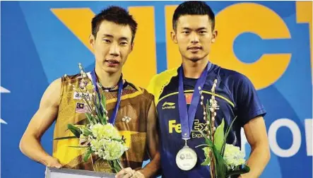  ??  ?? A rivalry unmatched: Lee Chong Wei and Lin Dan on the podium after their Korean Open men’s singles final yesterday. Chong Wei won 12-21, 21-18, 21-14. — AFP