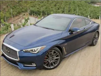  ??  ?? The 2017 Infiniti Q60 now ranks as a legitimate premium sports coupe with three engine choices, standard AWD and daring styling starting with the signature double arch grille.