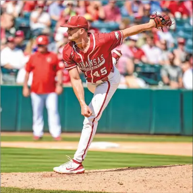  ?? CRAVEN WHITLOW/NATE Allen Sports Service ?? Razorback pitcher Kevin Kopps throws a strike against N.C. State in the Fayettevil­le Super Regional at Baum-walker Stadium in Fayettevil­le.