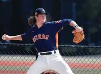  ?? Karen Warren / Staff photograph­er ?? Heights graduate Forrest Whitley, the Astros’ first-round pick in 2016, was added to the 40-man roster in November.