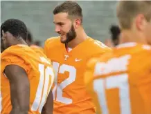  ?? PHOTO BY SAUL YOUNG/KNOXVILLE NEWS SENTINEL VIA AP ?? Quinten Dormady, center, is competing with Jarrett Guarantano for Tennessee’s starting quarterbac­k job.
