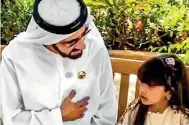  ??  ?? MARK OF AFFECTION: Sheikh Mohammed meets Salama Al Kahtani at her home in Al Ain.
