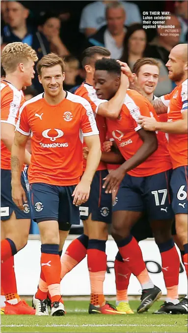  ?? PICTURES: Action Images ?? ON THEIR WAY: Luton celebrate their opener against Wycombe