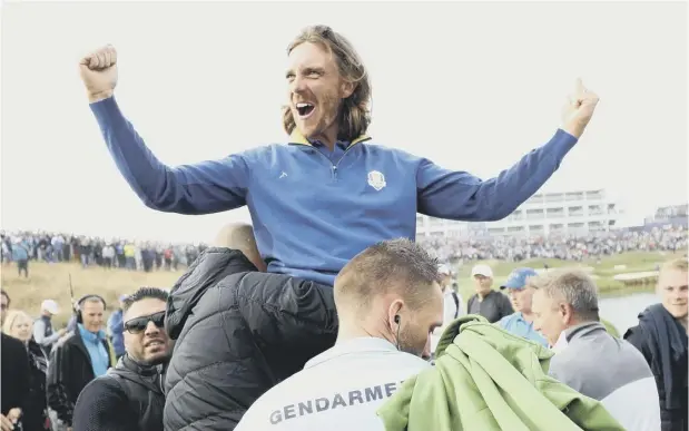  ??  ?? 0 Tommy Fleetwood celebrates Europe’s 2018 Ryder Cup win in Paris. Inset below, Padraig Harrington, who is due to captain Europe at Whistling Straits in September.