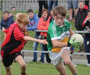  ??  ?? A determined Robbie Chapman (Duffry Rovers) has Cian Rossiter on his tail.