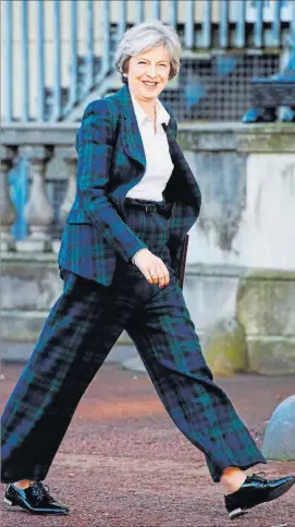  ?? AFP ?? Theresa May, ayer, a su llegada a la Lancaster House de Londres.