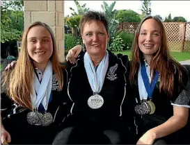  ?? PHOTO: EMILY FORD/FAIRFAX NZ ?? Paula Daysh and her daughters Jaime, left, and Maddie Ham returned home with an impressive medal collection