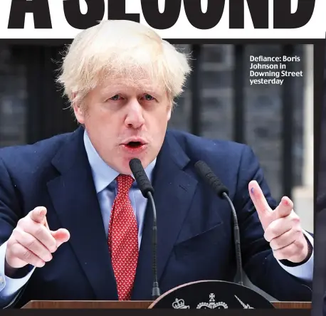  ??  ?? Defiance: Boris Johnson in Downing Street yesterday