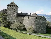  ?? The New York Times/MARINA PASCUCCI ?? Vaduz Castle stands as one of many sights on the Liechtenst­ein Trail. Europe’s fourth-smallest country has marked its 300th anniversar­y by joining all of its 11 towns via 46.6 miles of twisting, mountainou­s hiking trails.