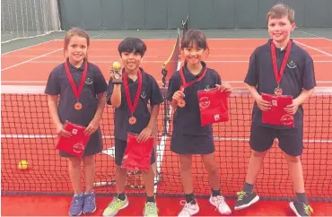  ??  ?? Winners in the South Wales schools tennis championsh­ips 2016 Year 3-4 mixed Oakleigh School