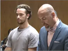  ?? Photo courtesy WPRI 12 ?? Tyler Grenon, 23, of Attleboro, left, appears in Sixth District Court in Providence on Wednesday with his lawyer, Collin M. Geiselman, during a court appearance on charges that Grenon took part in the murder of Woonsocket’s Constance Gauthier....