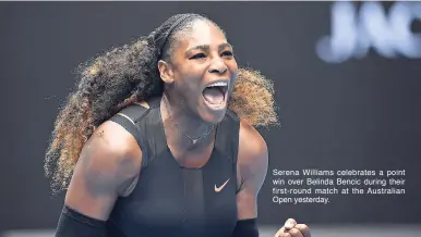  ??  ?? Serena Williams celebrates a point win over Belinda Bencic during their first-round match at the Australian Open yesterday.